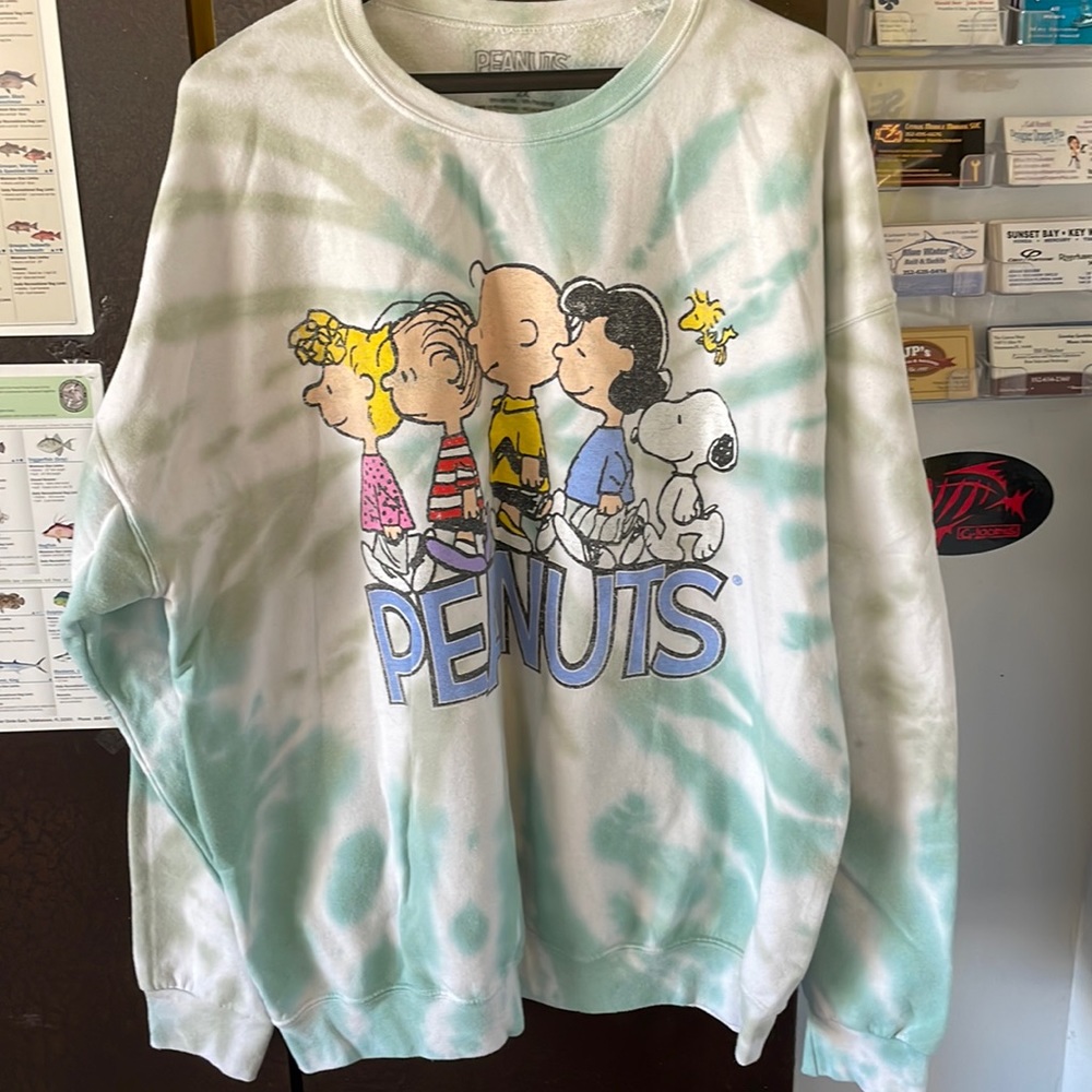 Peanuts a Snoopy tie-dye sweatshirt. Women’s size 2X.